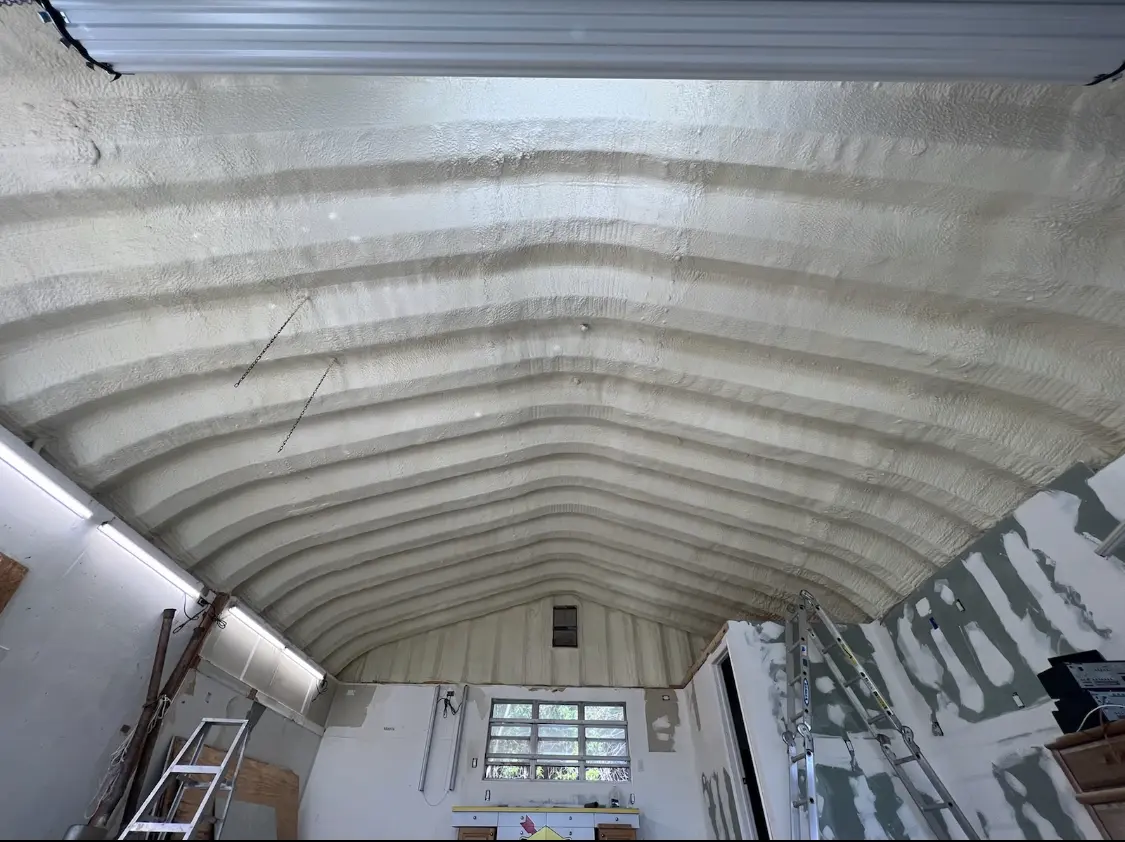Spray polyurethane foam applied to the underside of a metal roof deck in Seal Beach
